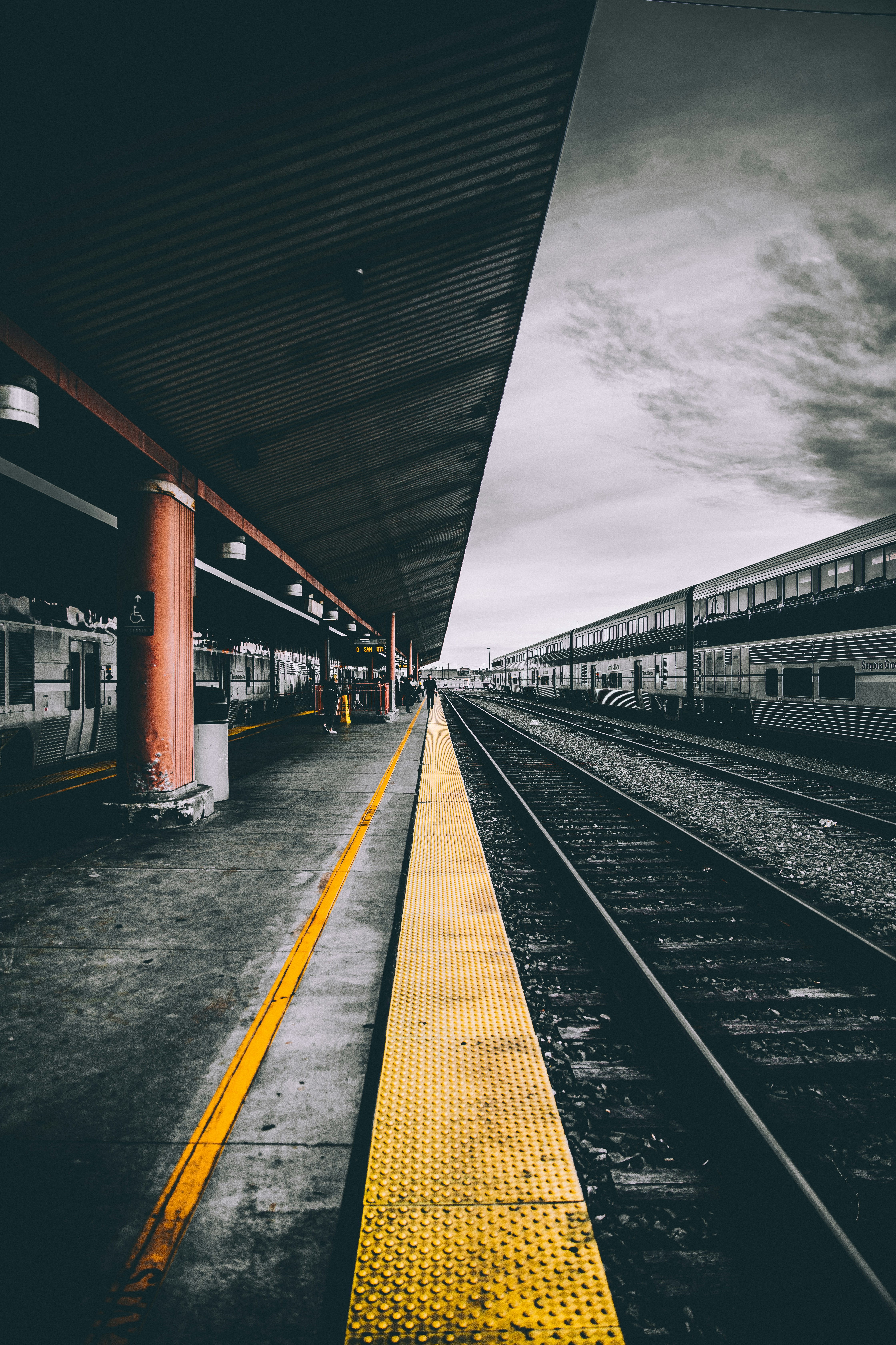 selective color photography of train railways